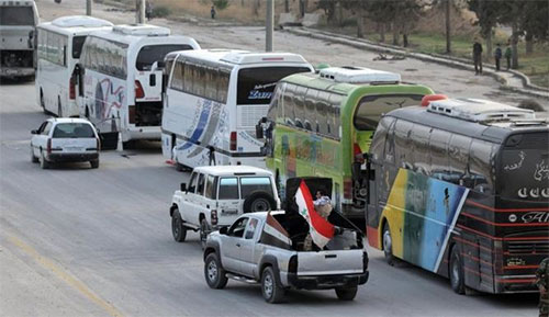 El último grupo de armados y civiles parten destino a Idlib La ciudad siria de Harasta libre de terroristas